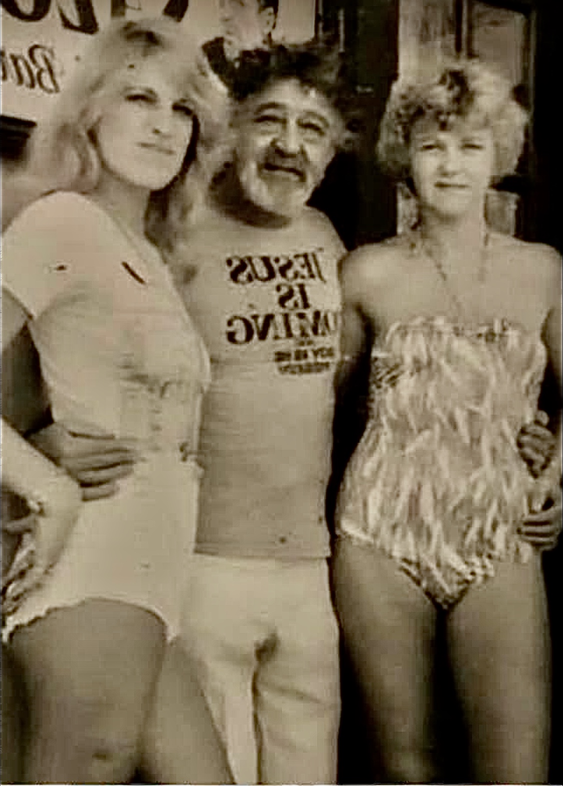 In 1976 I finally moved to Key West and started working for my grandfather the famous fishermen gambler owner of the original Hemingway bar, and eventually become mayor of Key West These are some of the girls that work for him 45 years ago the one on the right and that was the big problem my grandfather was wearing his favorite shirt Jesus coming and boy is he pissed I have the slide reversed