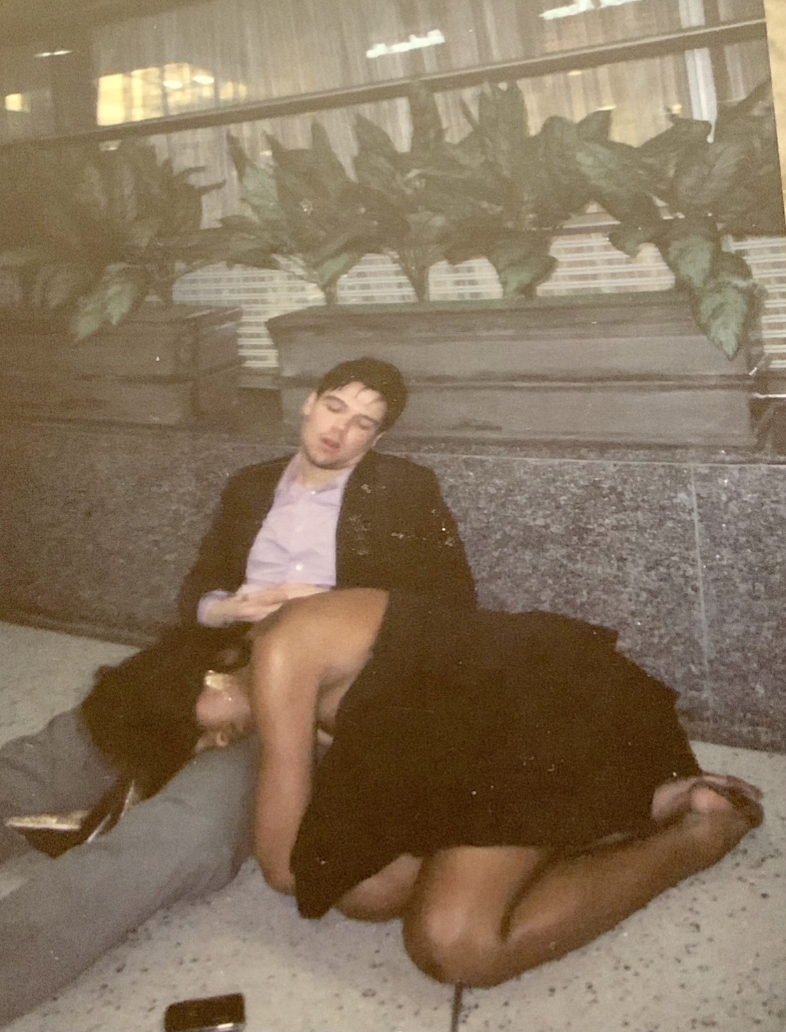 Love this photo I took 3 o’clock in the morning Pennsylvania train station New Year’s there is couples all over the place that missed the train I like the cell phone in front of them