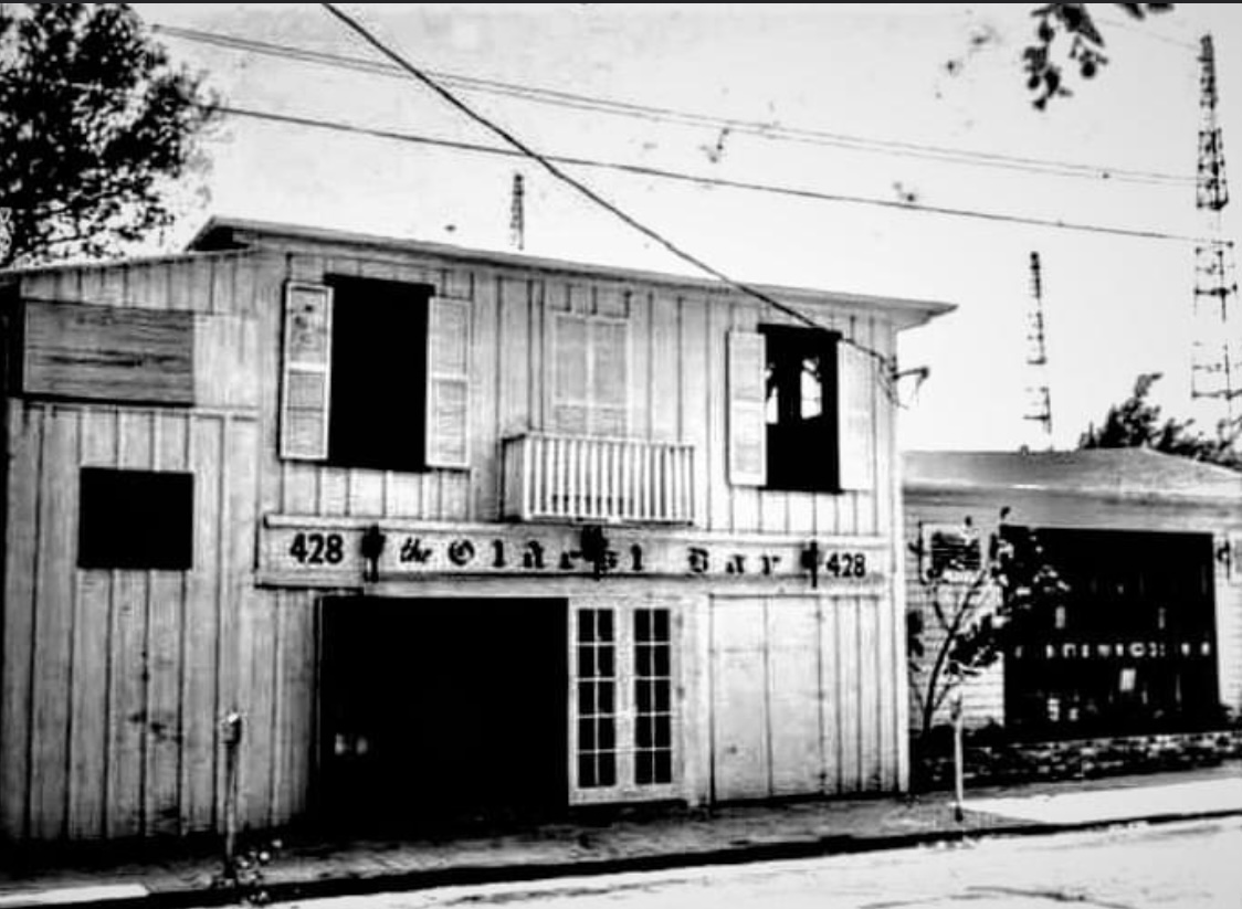 In 1963 my grandfather Captain Tony took over the oldest bar in Key West Florida it was actually called that it was off-limits to all military personnel crazy prostitution and gambling upstairs a lot of smugglers criminals would hang out there four pool tables inside on the right a great stage for entertainment and drag shows my grandfather fell in love with it right away he was already a smuggler and he loves women and gambling I started working for him there in 1976 It was still pretty crazy