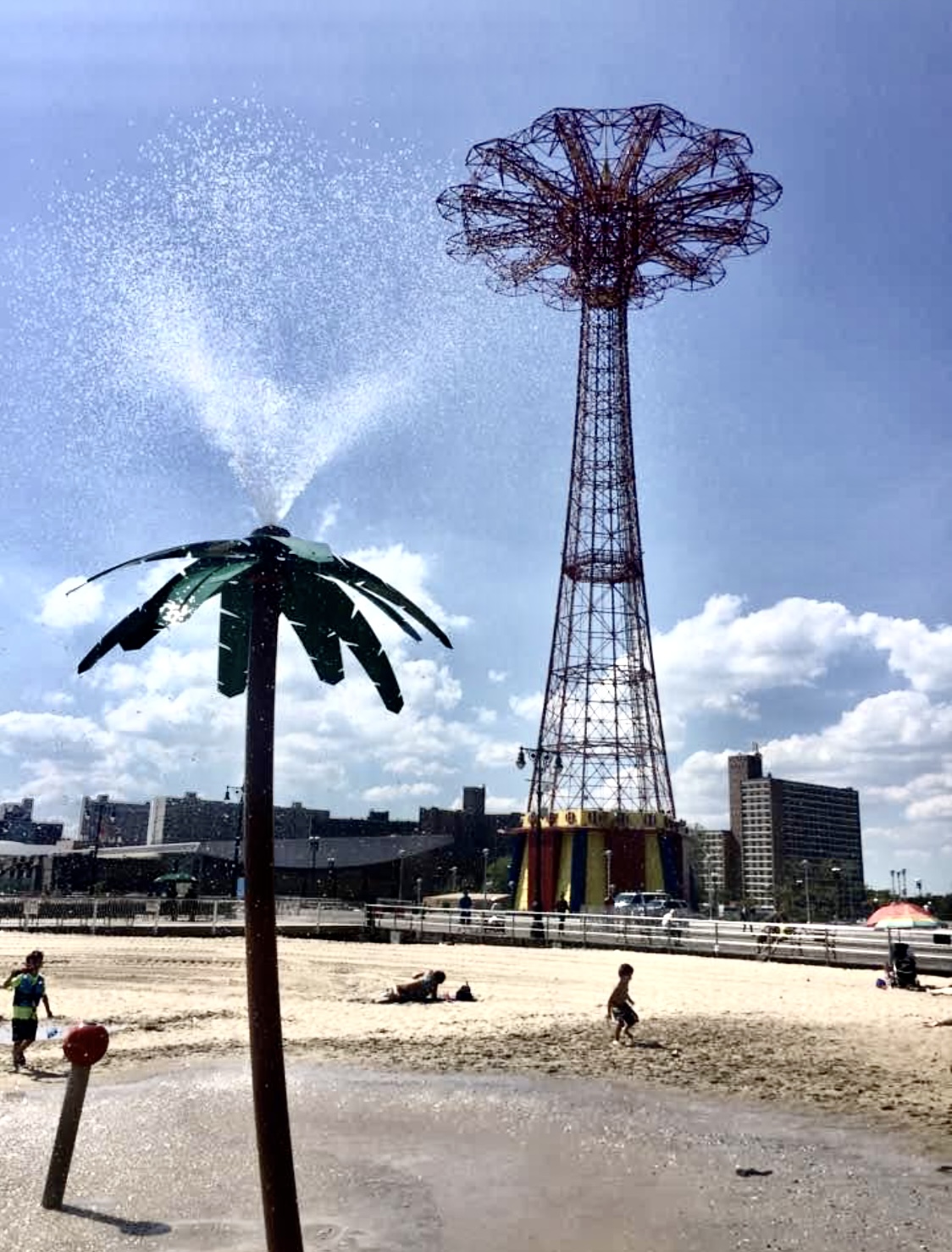 I have to admit the Coney Island Beach isn’t the cleanest or the water I’ve been in it twice out of 100 times I’ve been there but what is really cool are these fake palm trees that shoot out cool fresh water all day in the hot sun It goes good with frozen margaritas