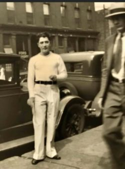 If you looked at 1000 photos of Sal he is always well dressed with one of his outfits in 1918 he got his first suit at the age of seven this photo was taken in 1933