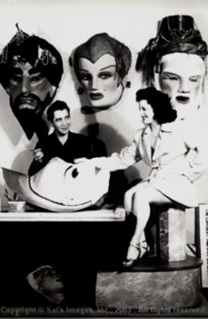 The four big masks you’re looking at were made by my great uncle Sal in 1937 this photo was taken in 1949 at his studio in the world of mirth a bizarre traveling carnival Sal use these masks for his mind reading hypnotizing act The two big ones on the right are at our house with 65 other ones trust me these masks are more than just masks because of the mixture in their papier-mâché mix pyramid scrapings from Egypt, Haitian voodoo dust, Cambodian opium, And then those secret potions from around the world one of them is actually looking at me right now as I’m working on my website