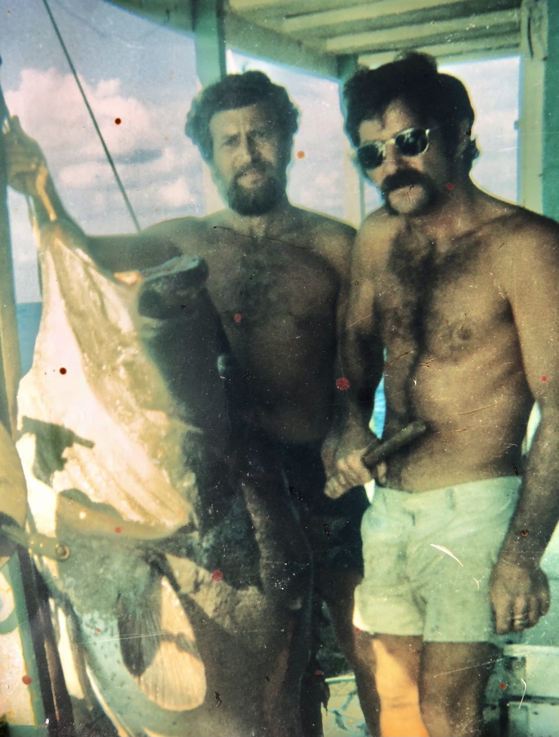 The year 1976 a hell of a trip to dry Tortugas we kicked ass that’s my dad and Denny Danny would eventually become one of my partners in Key West 20 years later I took this picture with My dad’s cheap camera before I even became a photographer we are out for five days I was 20 years old back then 45 years ago