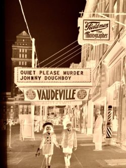 Very interesting large format negative right here the year 1943 the two little kids holding hands is my dad Louis and his little sister my Aunt Tonia. The guy standing in front of the mafia bookie joint barbershop was the lookout guy lotta action in the back room in that place above was a photography front Sal did a lot of wild photos up there you’ll see them in this category because there is 800 great photos taken by Sal captain Tony and myself all those images on this category I have great stories enjoy