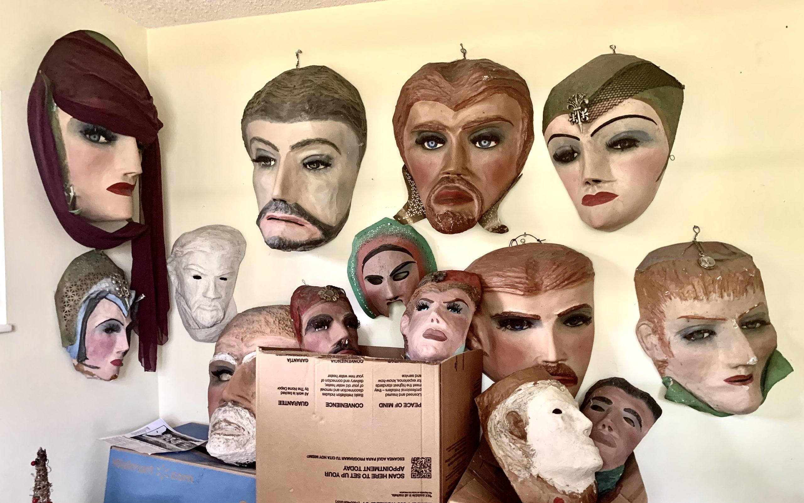 This is my mask room where I do most of my thinking writing And posting there’s 35 packed in boxes that I take out once in a while I switch them with the ones on the wall most of these are 2 foot tall and were made in the late 40s they weigh about 10 pounds the really large ones are throughout our house those are massive the big masks have some crazy special ingredients in their papier-mâché mix pyramid scrapings from Egypt, Real authentication voodoo dust, And some crazy secret potions from around the world Definitely don’t fuck with them they’re over 80 years old and have been used in all of Sal‘s mask photography Studios as far back as the mid-30s I also had them in my studios in the last 20 years there is also a cool collection of masks that you could wear with their mouth cut out you could see one of them in the middle of these masks they were used in Cuba Indonesia And above Captain Tony’s saloon in the 60s if these mass could talk Tennessee Williams and Shel Silver